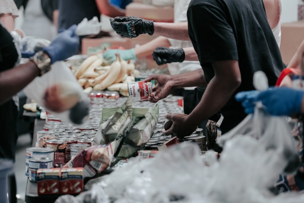 people distributing foods charity