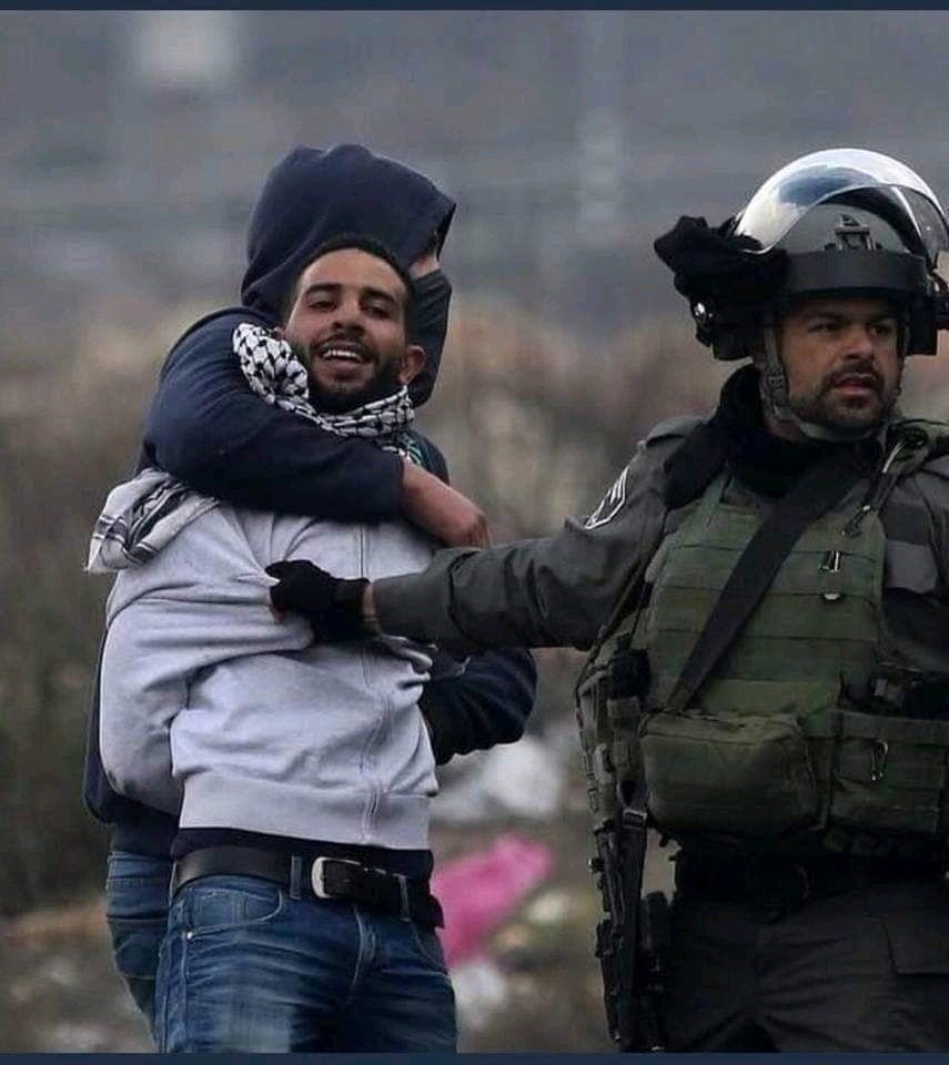 Palestinians Smiling While Getting Arrested 2