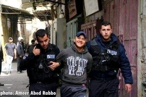 Palestinians Smiling While Getting Arrested 7