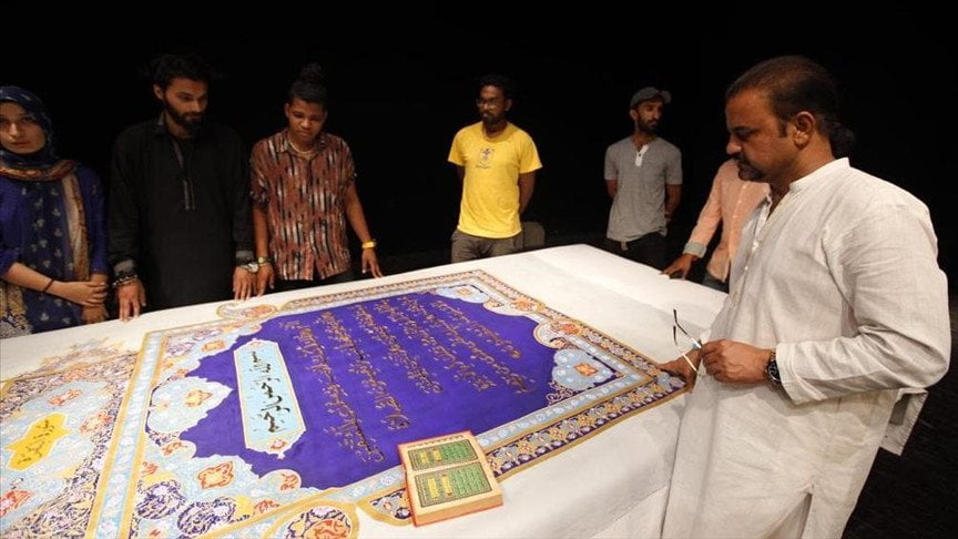 Pakistani artists are preparing the worlds largest copy of the Holy Quran