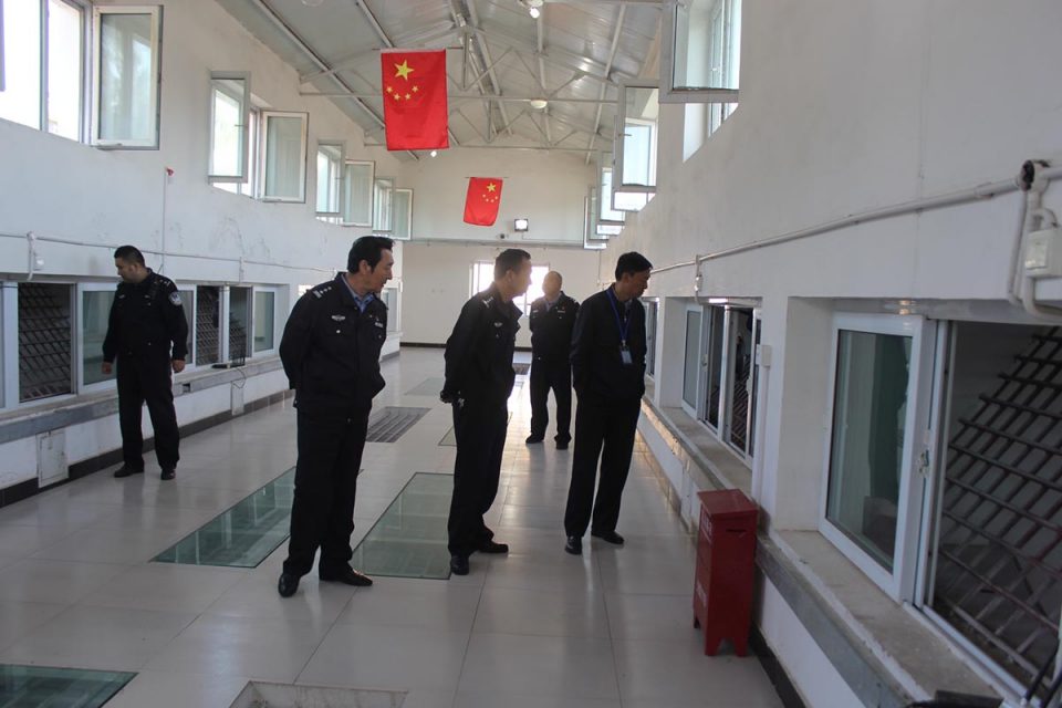 Xinjiang Police Files Officials tour facility 960x640 1