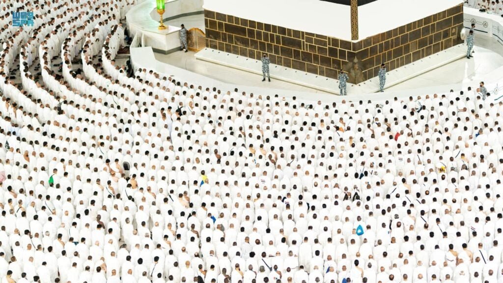 Hajj pilgrims praying at Masjid al haram infront of Kaaba