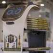 Robots Distribute Quran grand mosque