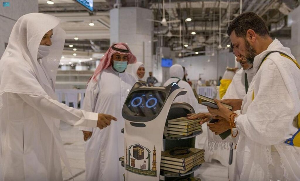 Smart Robots distibuting Quran in Grand Mosque 2