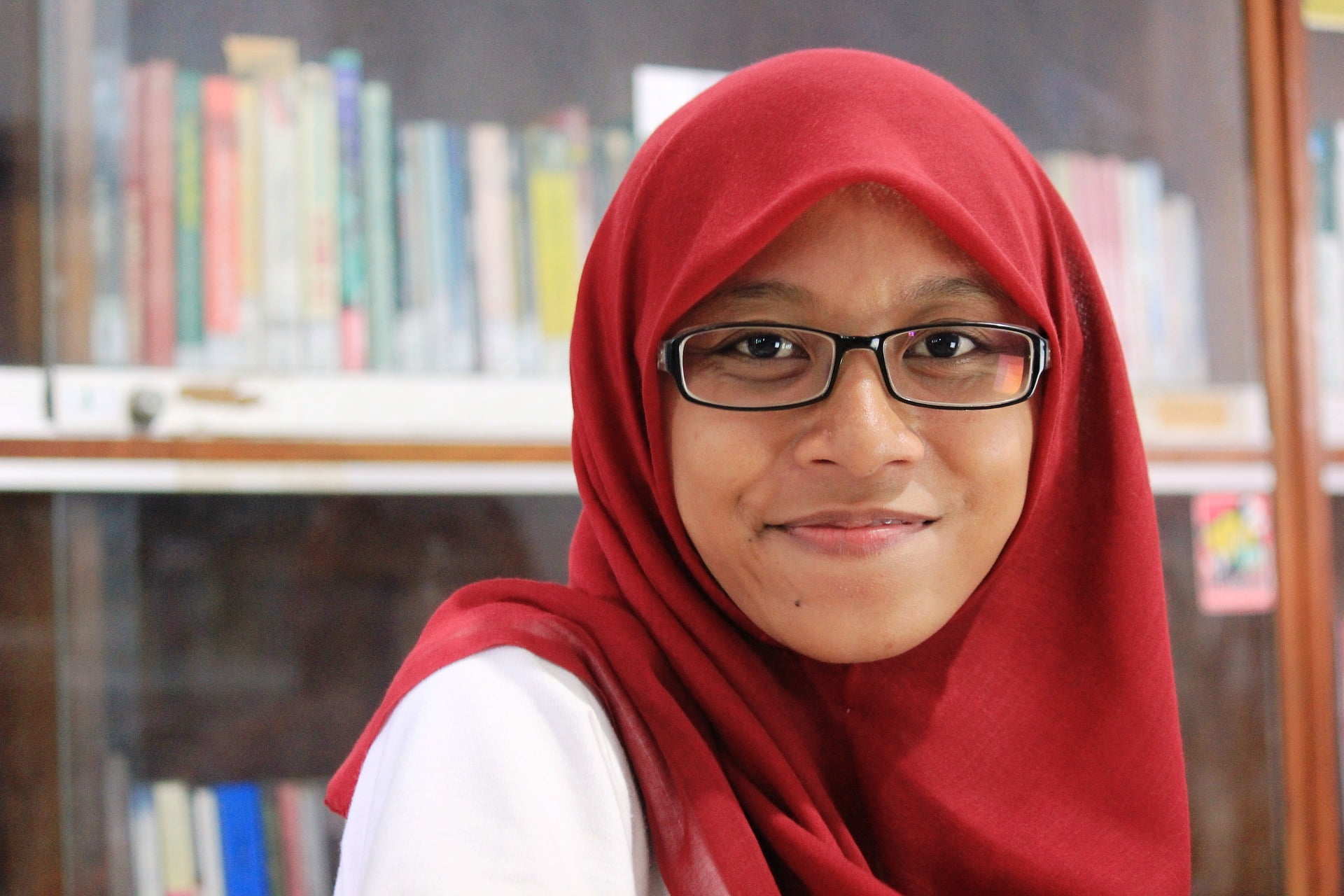 muslim girl in red headscarf