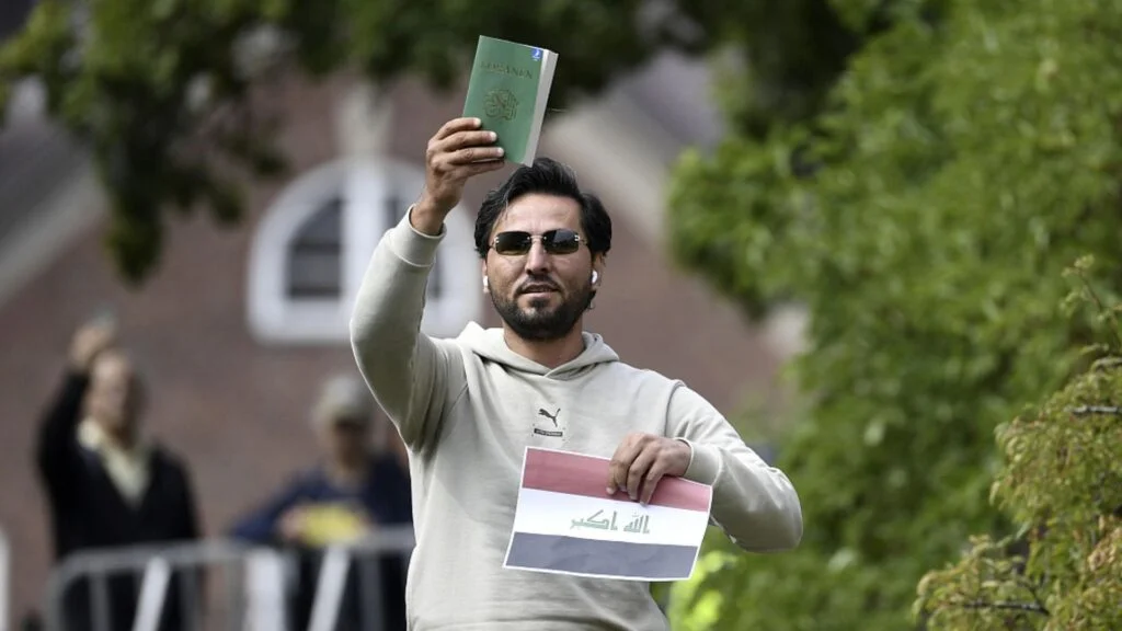 Salwan Momika with Iraqi flag in Sweden
