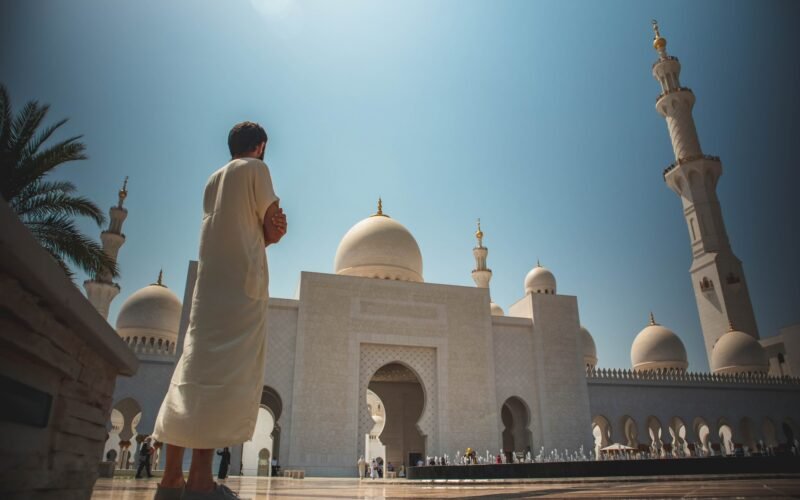 Muslim man praying salah in dubai mosque