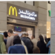 Muslims queuing up at Mcdonalds in Madinah