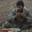 poor man having meal gaza