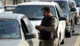 Saudi policeman checking permits