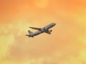 airplane A380 in the orange sky
