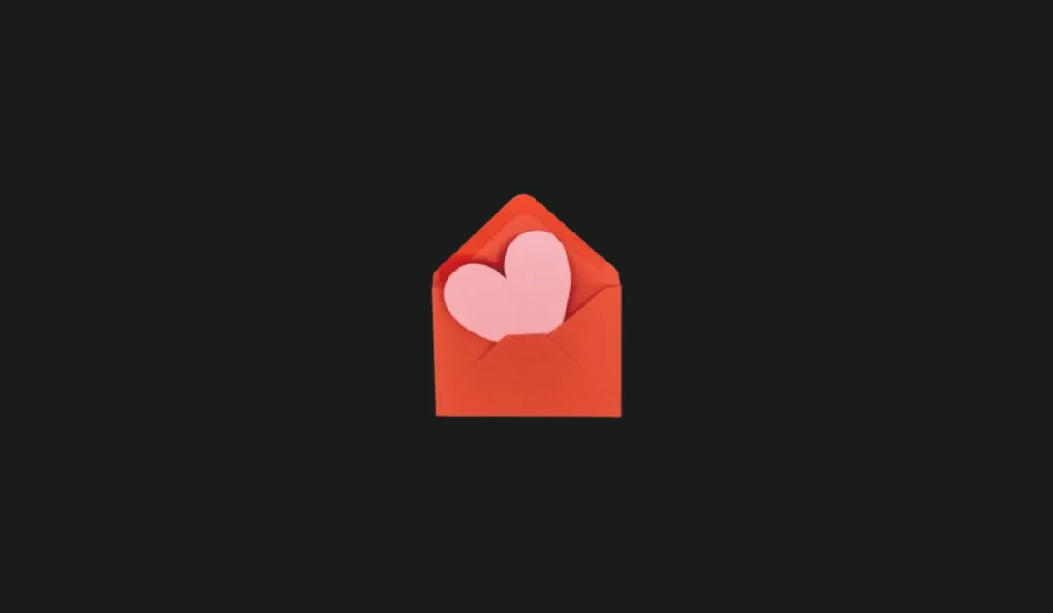 red envelope with heart and black background