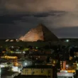Giza City and Pyramids at night