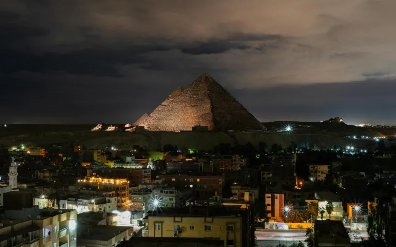 Giza City and Pyramids at night