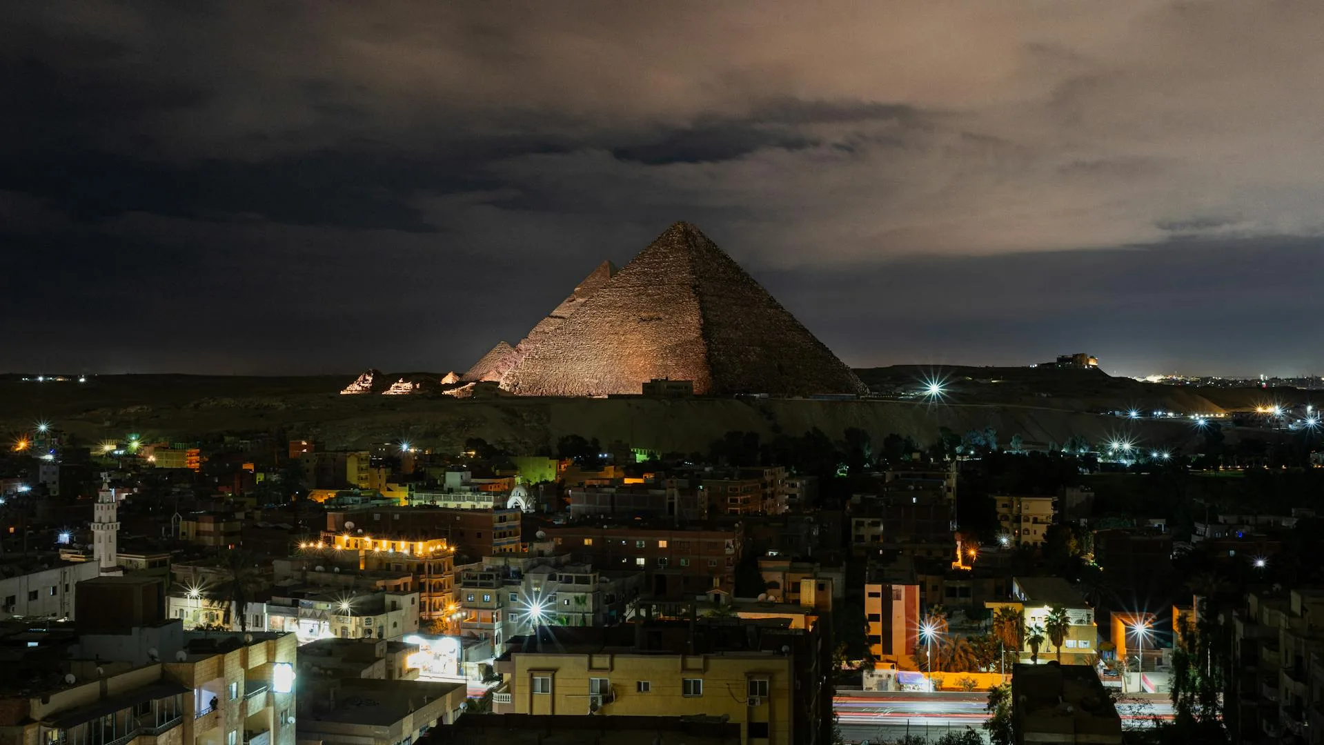 Giza City and Pyramids at night