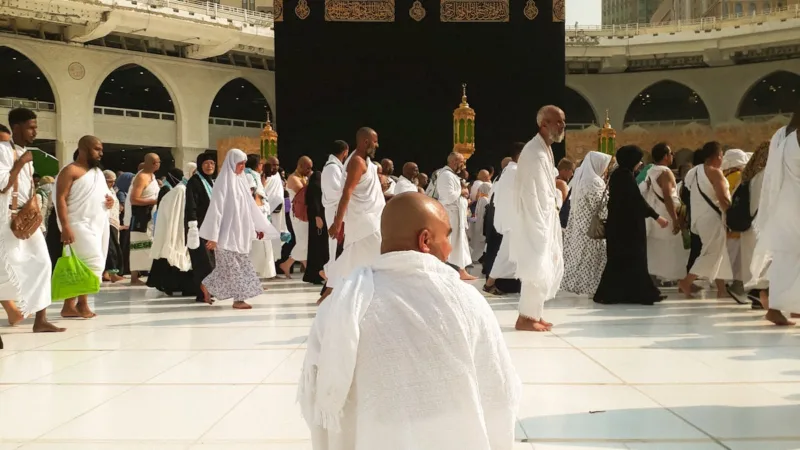 man sitting in the mataaf of Grand mosque