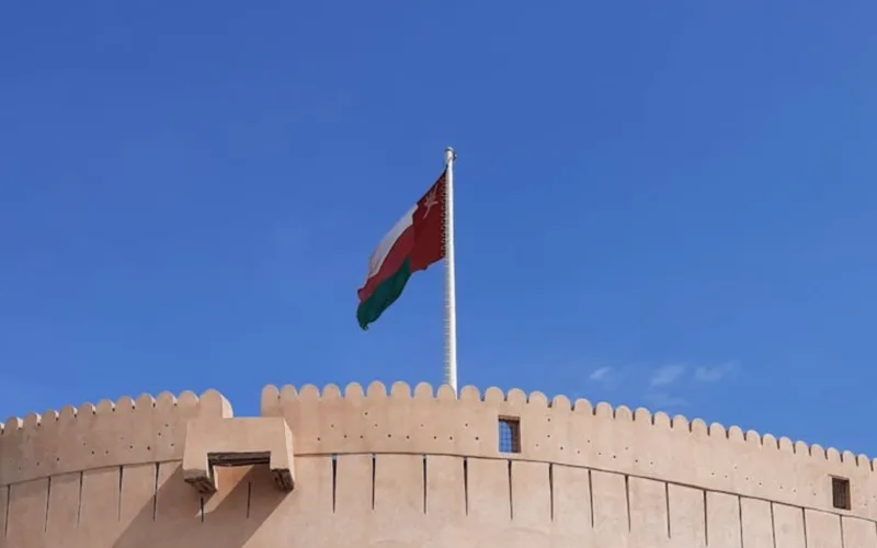 oman flag on castle