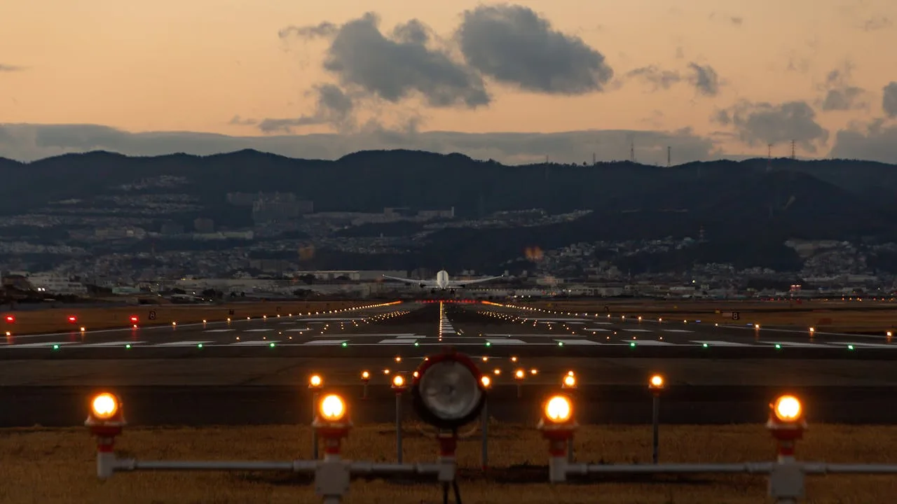 plane taking off at sun set