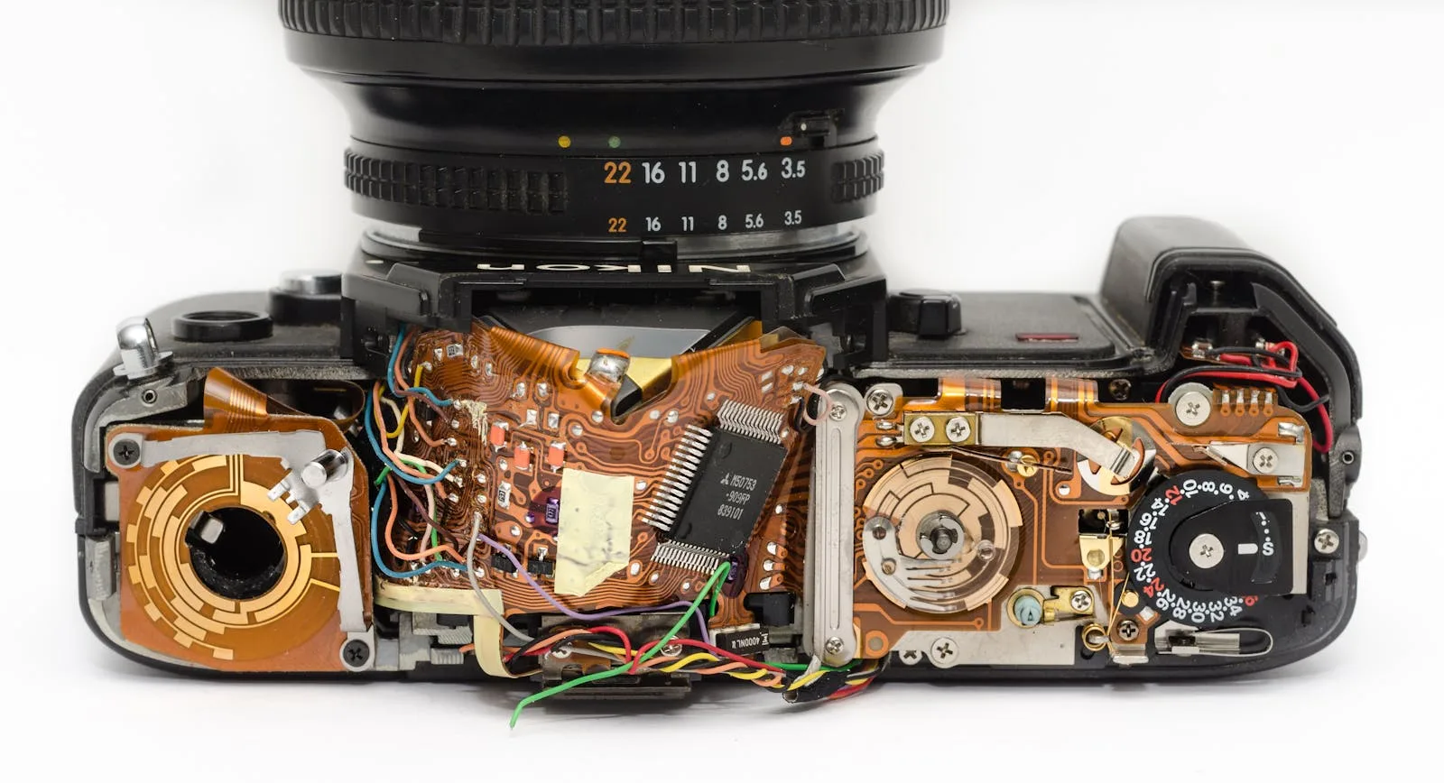 Black Dslr Camera Showing Its Circuit Board