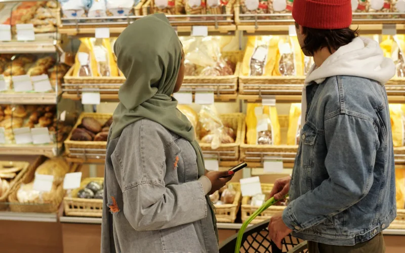 Muslim Couple Buying Groceries