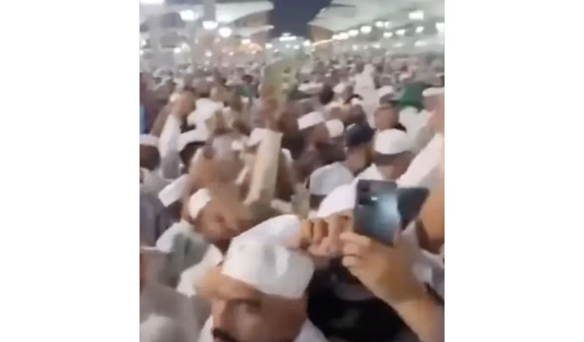 man chanting slogans prophet's mosque