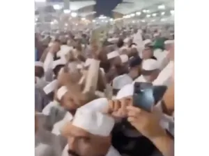 man chanting slogans prophet's mosque