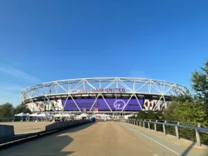 a stadium with a large sign on the side of it