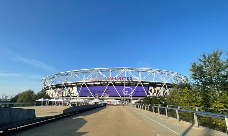 a stadium with a large sign on the side of it