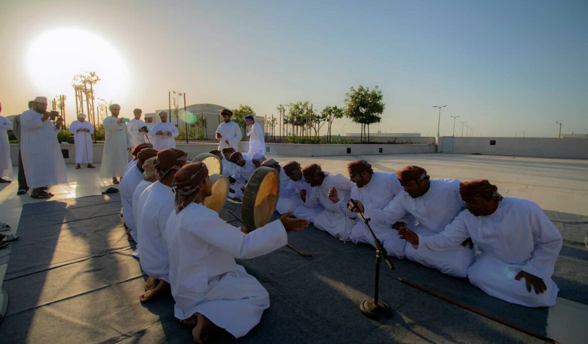 arab man on the ground in the sunset