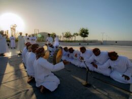 arab man on the ground in the sunset