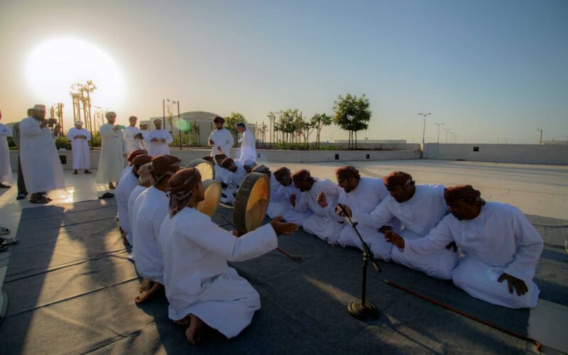 arab man on the ground in the sunset