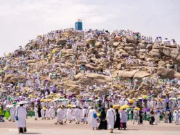 People Walking Beside the Rocky Mountain jabal rahma