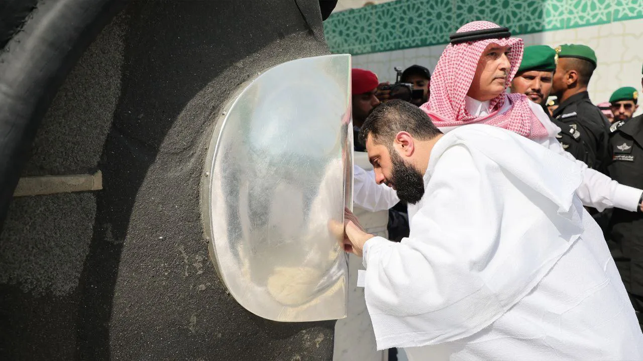 Syrian President Ahmed Al Sharaa kissing black stone