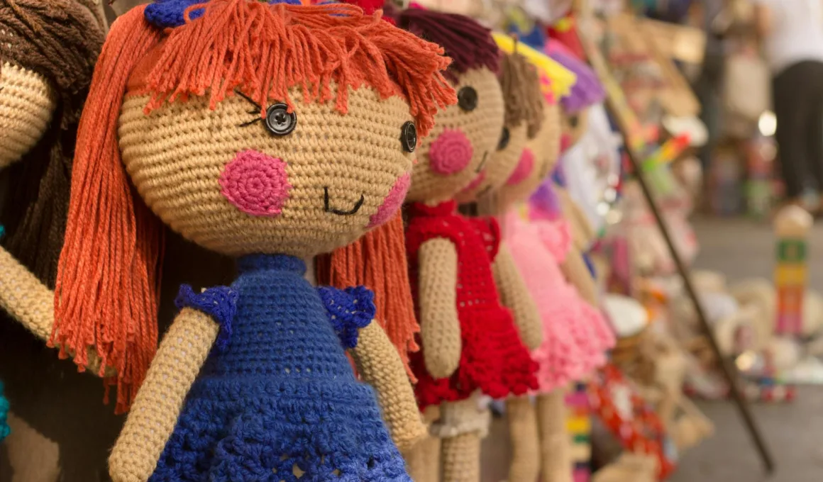 brown purple red knitted doll
