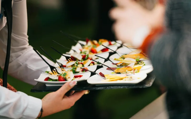 catering event with gourmet appetizers on tray