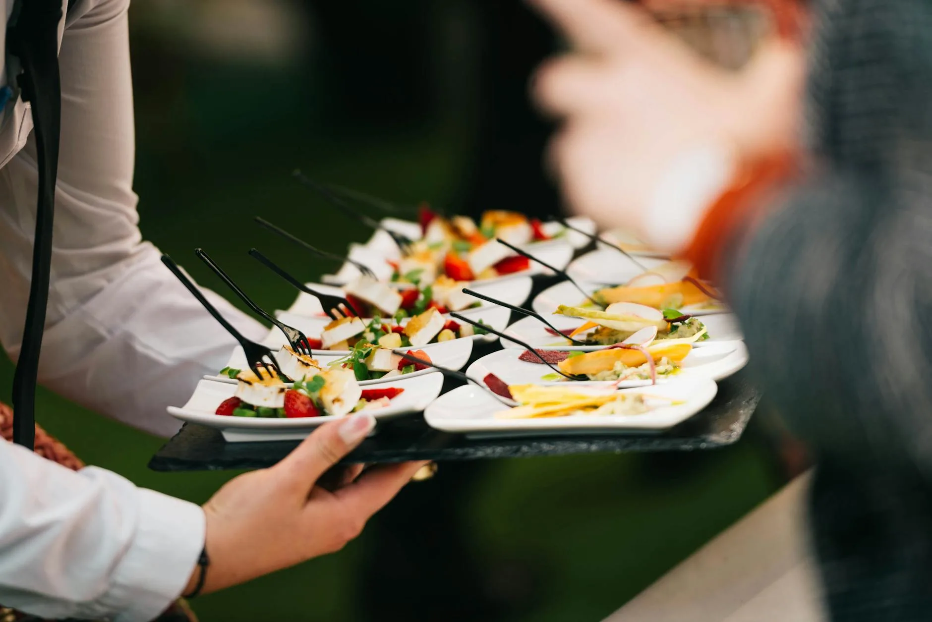 catering event with gourmet appetizers on tray
