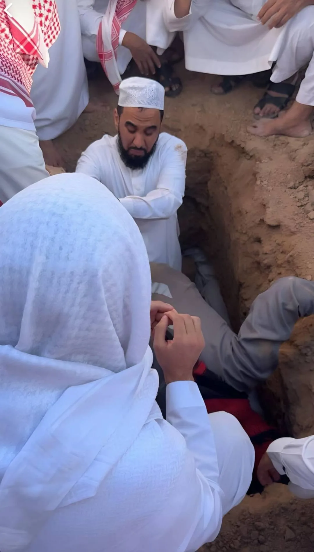 Imam of Kaaba Sheikh Abullah Juhany during burial of his father in Al-Baqee, Madina.