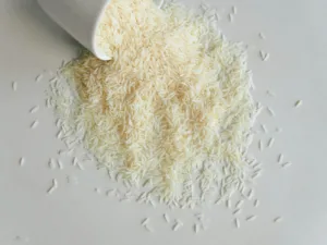 uncooked rice on white surface