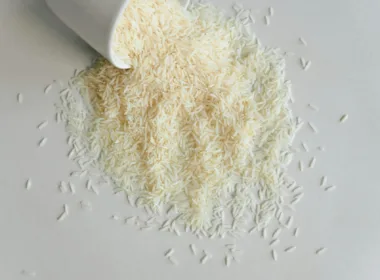 uncooked rice on white surface