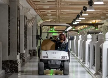 man driving pilgrim cart inside masjid al haram grand mosque in makkah