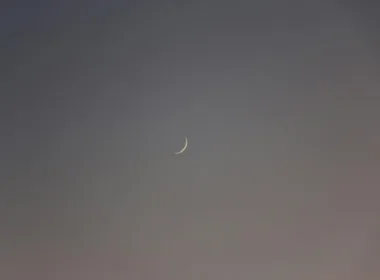 a crescent moon in the sky