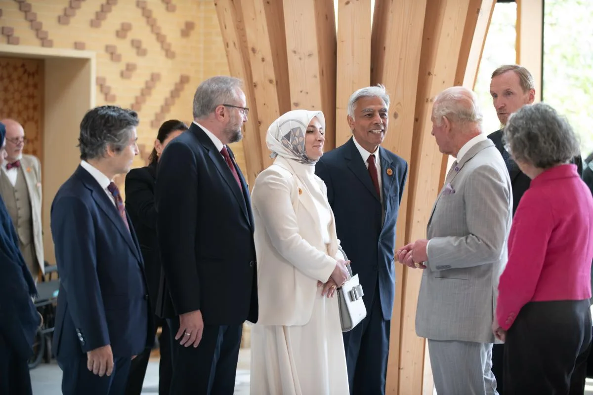 king charles talking to mosque staff
