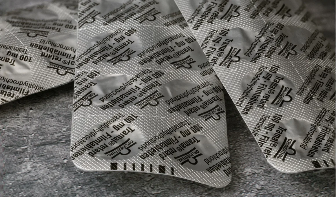 tramadol blister pack on concrete surface