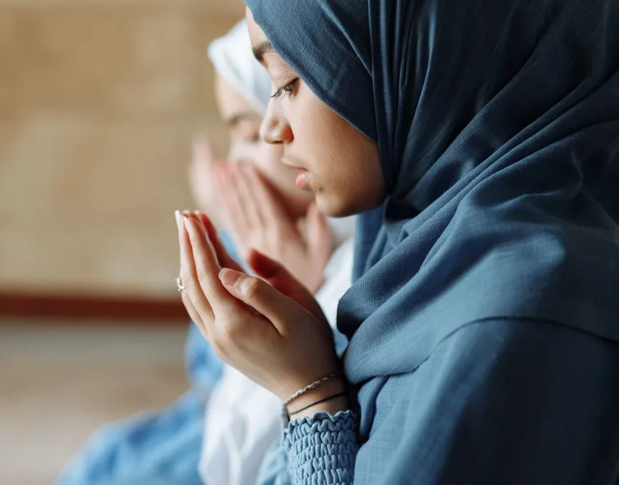 a woman in blue hijab