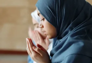 a woman in blue hijab