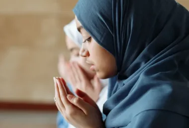 a woman in blue hijab