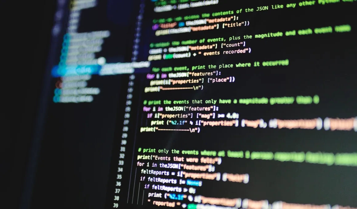 monitor displaying lines of code
