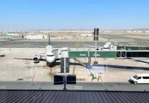 airplane at jeddah airport terminal gate
